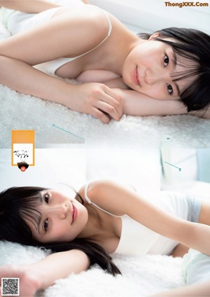 A couple of women sitting on top of a bed.