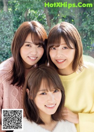 A group of three young women posing for a magazine cover.