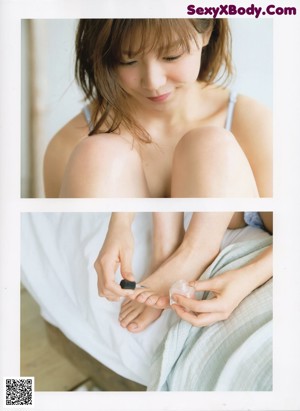 A magazine with a picture of a woman with short hair.